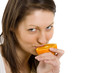 Photo: woman tasting an orange woman tasting an orange
