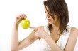 Photo: woman holding yellow apple woman holding yellow apple