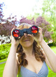 Foto: Looking through field glasses Looking through field glasses