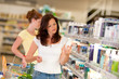 Shopping series - Brown hair woman in cosmetics department Shopping series - Brown hair woman in cosmetics department