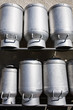 Milk churns on a shelf Milk churns on a shelf