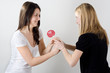 Girls fighting for a lollipop
