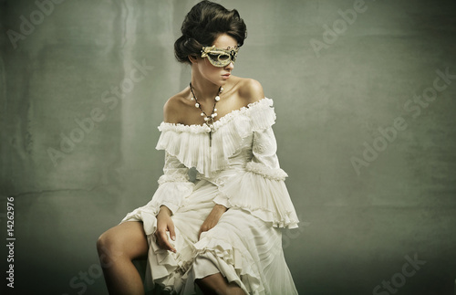 Photo: beautiful woman in the mask beautiful woman in the mask