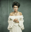 Beautiful woman in calm pose, lovely dress