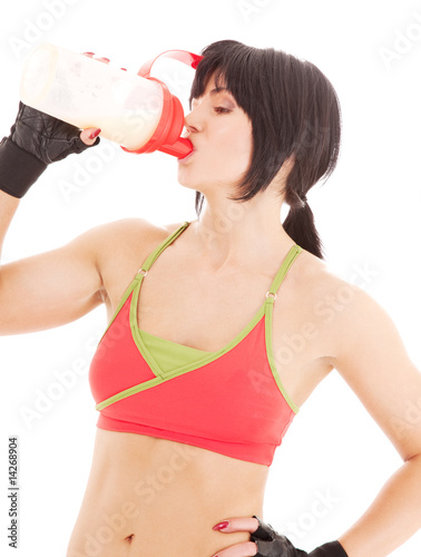 fitness instructor with protein shake