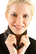 Beautiful young blonde with brackets on teeth in white