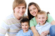 portrait of happy laughing young family with two sons