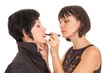 woman applying make up