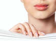 Closeup of woman face with pink lips