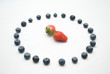 Strawberry and blueberry in clock formation