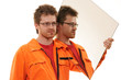 worker in orange workwear carries a mirror, isolated on white
