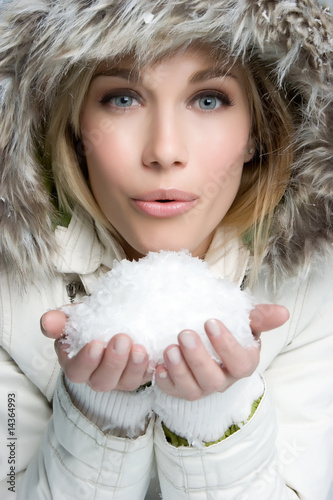 Photo: Girl Blowing Snow Girl Blowing Snow