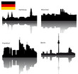 Vektor: Black vector silhouettes of German town with German flag Black vector silhouettes of German town with German flag