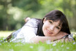 woman lying on grass
