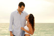 Photo: young couple with a height differance young couple with a height differance
