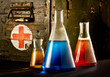 bottles with blue red brown liquid