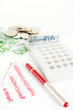 Euro banknotes and a pen on a graph Euro banknotes and a pen on a graph