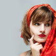 Portrait of a woman with red lipstick and red scarf Portrait of a woman with red lipstick and red scarf