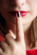Woman with silence sign, fashion look Woman with silence sign, fashion look