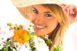 Photo: young blond girl with flowers young blond girl with flowers