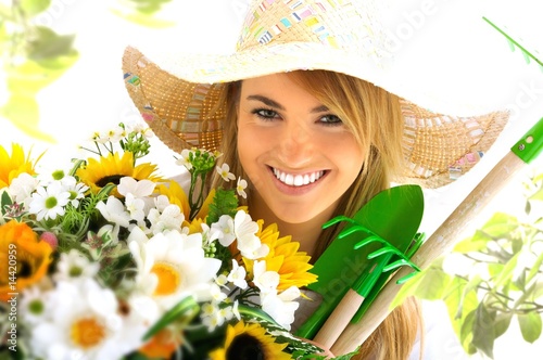 Photo: young girl with flowers young girl with flowers