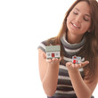 Young woman with two hose models in hands