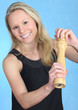pretty woman holding pepper mill