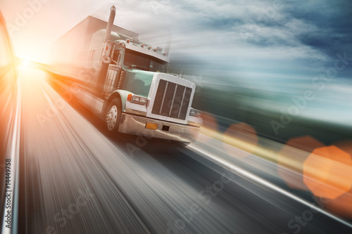 Photo: American truck on freeway, blurred motion American truck on freeway, blurred motion