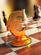Gold euro sign on a chessboard