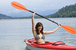 Happy woman on a kayak