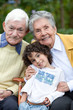 Photo: Child and grandparents Child and grandparents