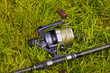 fishing reel on the grass
