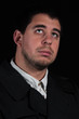 Male in thought, portrait isolated on black background Male in thought, portrait isolated on black background