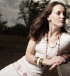Beautiful woman sitting in the park