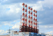 Factory and plant on blue sky background