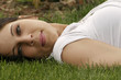 Lady lying the grass