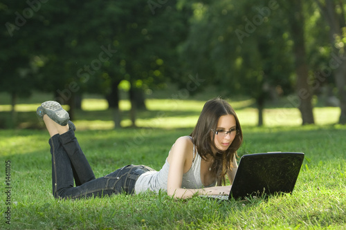 Photo: student with laptop outdoors student with laptop outdoors