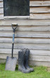 wellington boots and shovel ready for work
