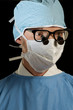 doctor in scrubs prepared for close examination doctor in scrubs prepared for close examination