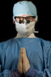 Surgeon praying for good result Surgeon praying for good result