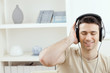 Man listening music with headphones