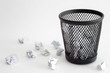 Trash bin and paper - office concept
