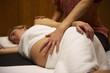 Pregnant woman being massaged
