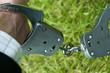 arm in handcuffs