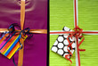 Colorful present shiny boxes with ribbon (close-up)