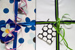 Colorful present shiny boxes with ribbon (close-up)