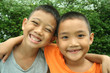 Two asian boys hanging in the park.