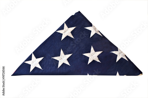 Photo: Folded flag of the United States isolated with clipping path Folded flag of the United States isolated with clipping path