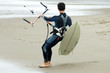 Kitesurfer preparing to enter water