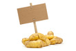 pommes de terre primeur et message sur fond blanc